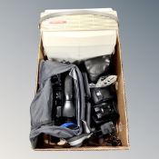 A camera bag containing video camera, Minolta camera, field glasses,