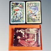 A Thomas De La Rue & Company plastic playing card box containing two sets of playing cards and a