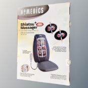 A Homedics massage cushion,