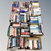 A pallet of seven boxes of mainly hardbacked books, autobiographies, novels,
