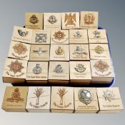 Twenty-four wooden lidded trinket boxes,