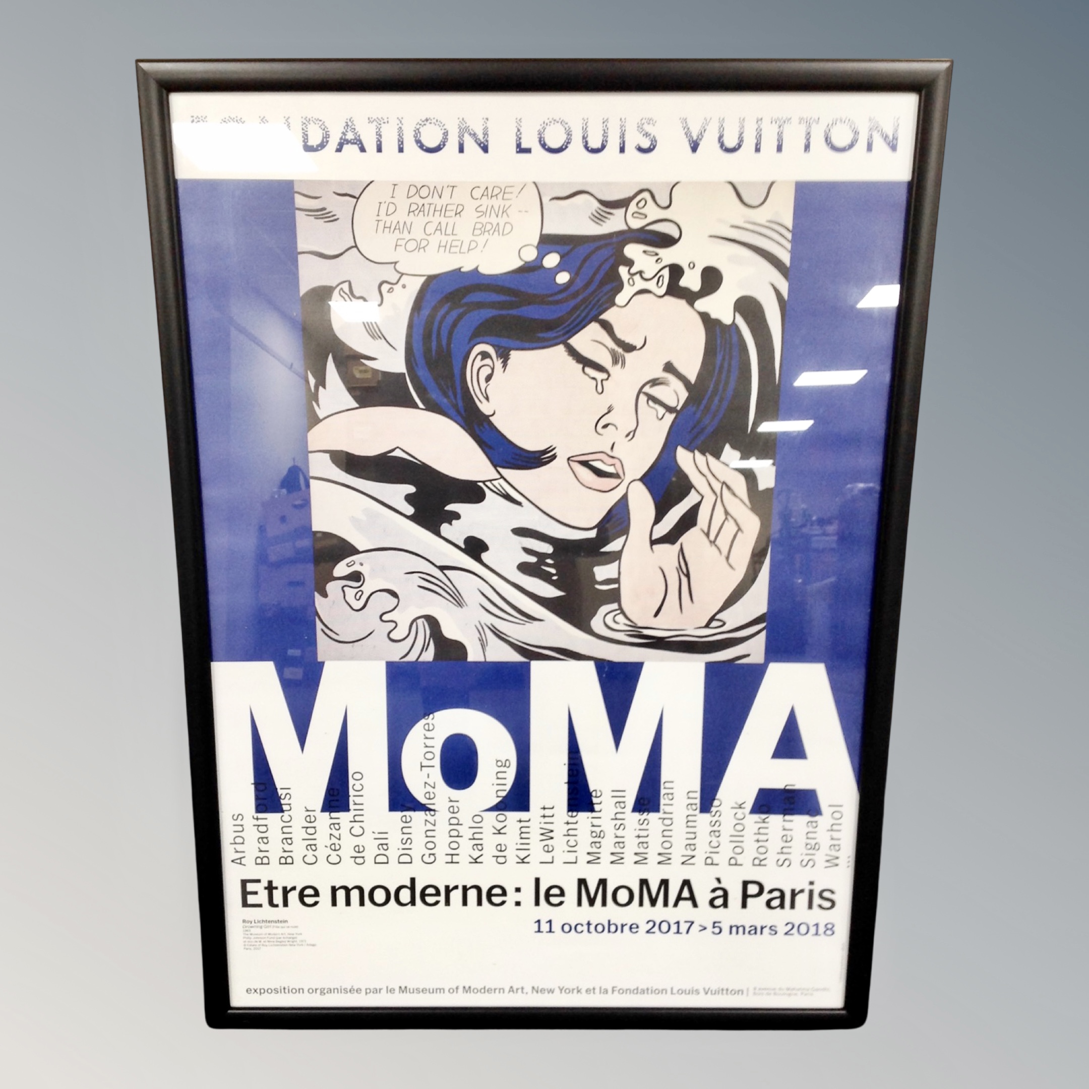 A Foundation Louis Vuitton MOMA Paris poster in frame