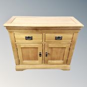 A contemporary solid oak sideboard width 98 cm