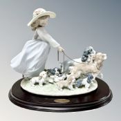 A Lladro figure Puppy Parade, number 6784,