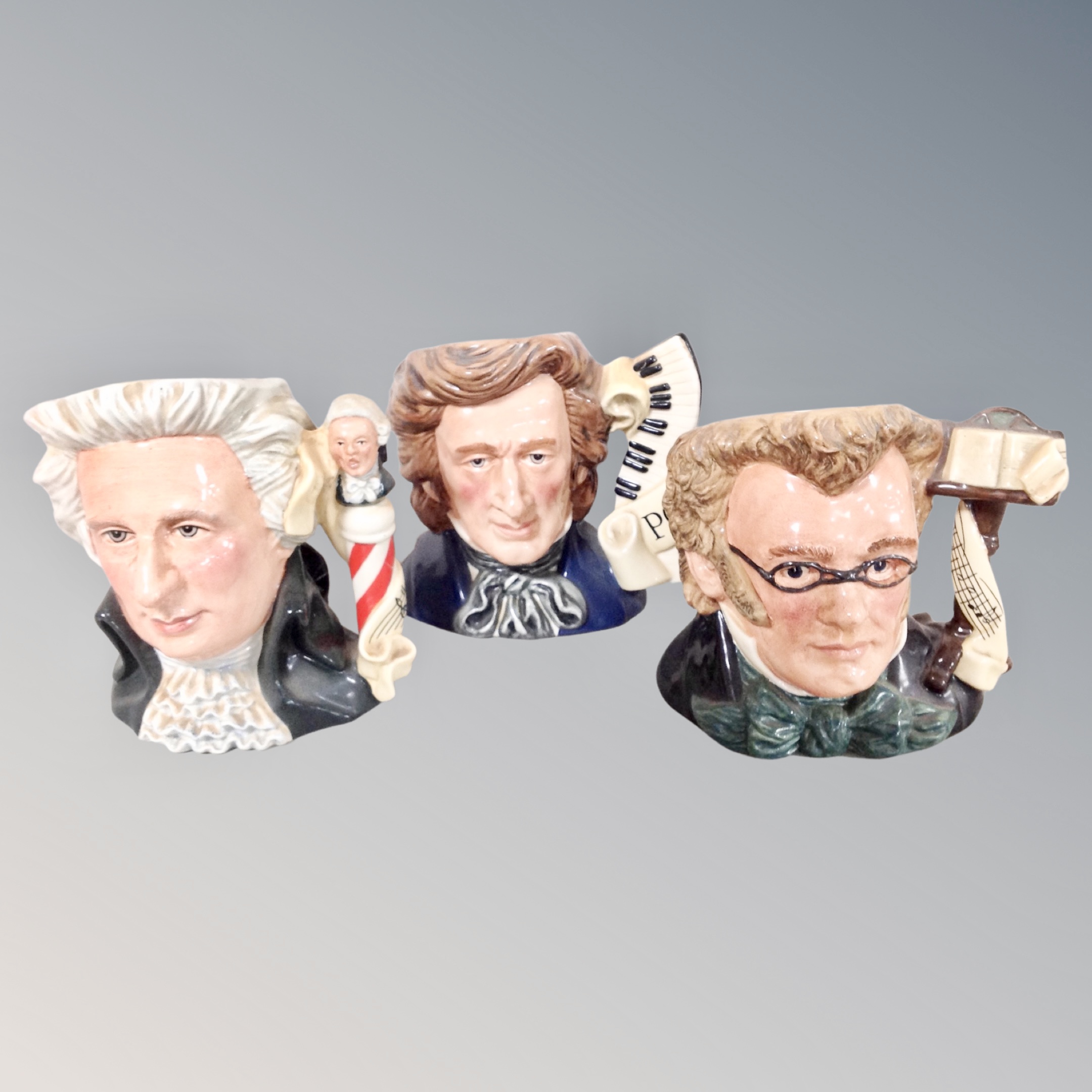 Three Royal Doulton character jugs : Chopin, Mozart,