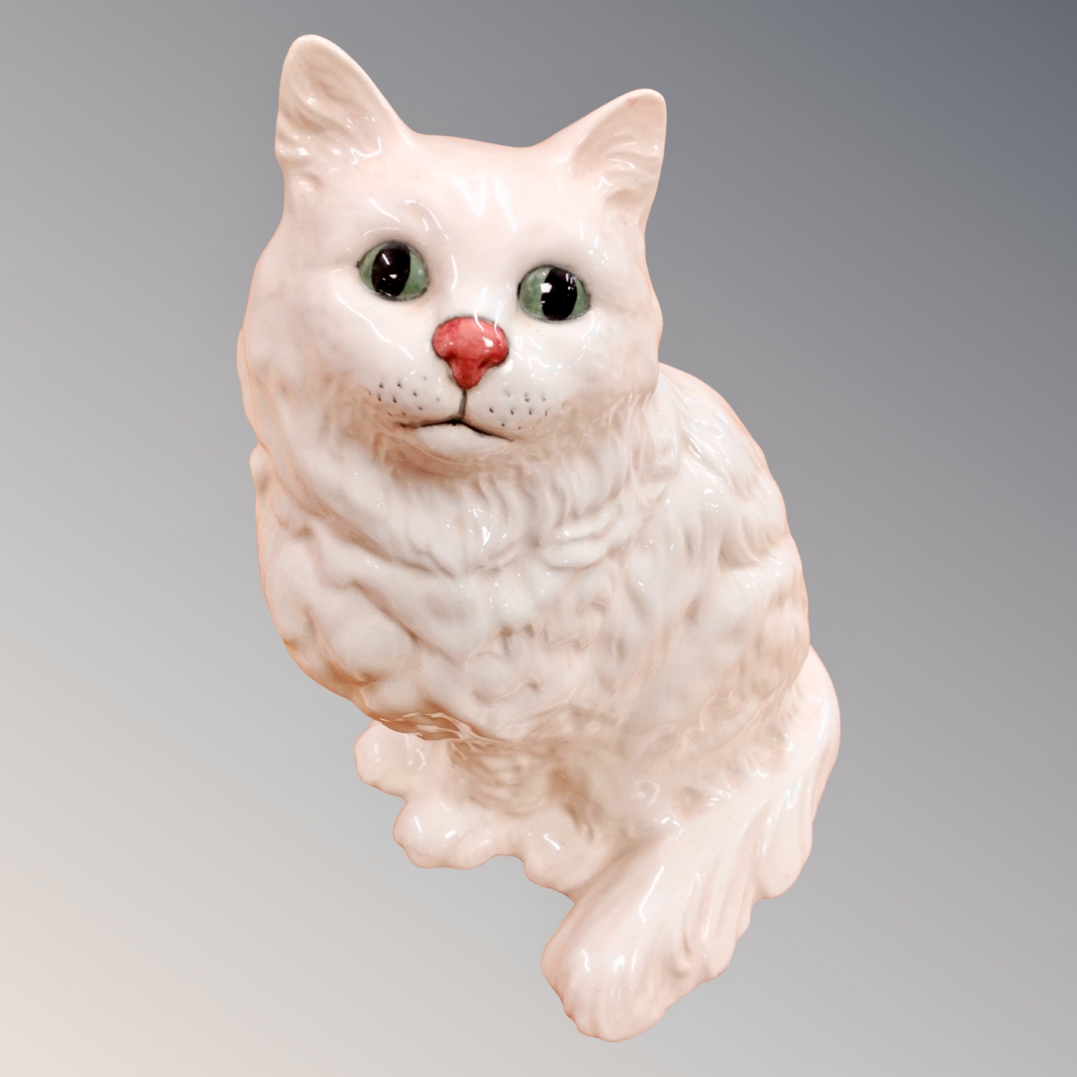 A Beswick figure of a cat,
