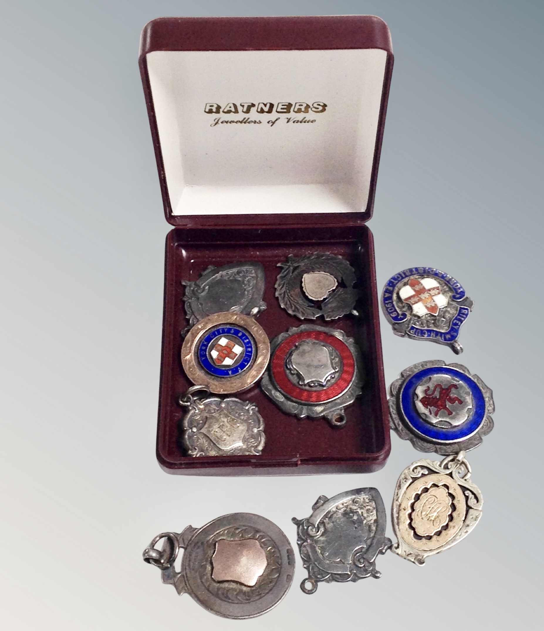 A collection of ten silver watch fob medals