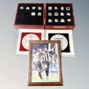 A boxed Newcastle United victory pin collection containing 20 pin badges,