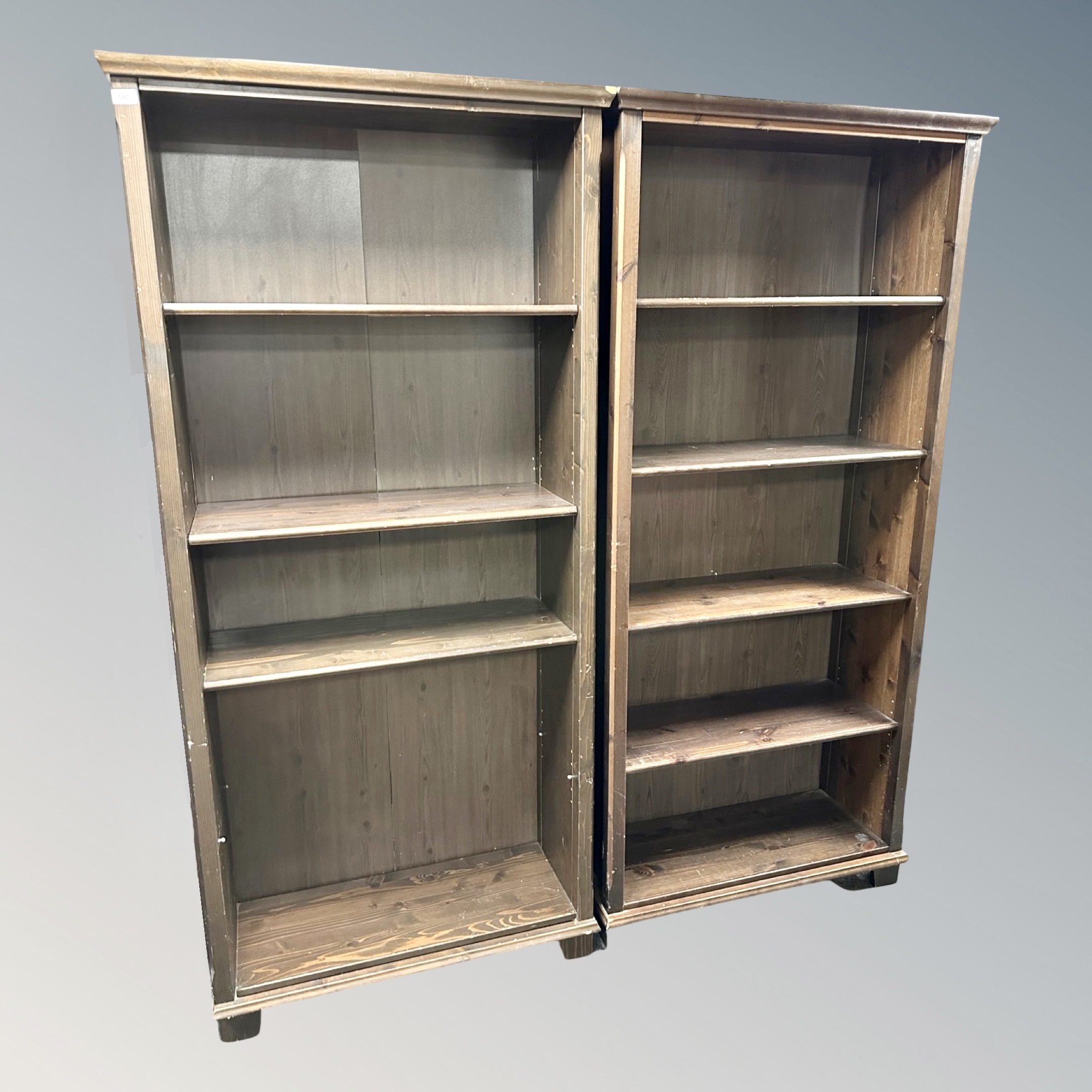 Two sets of contemporary stained pine open shelves