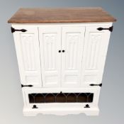 A painted oak side cabinet,