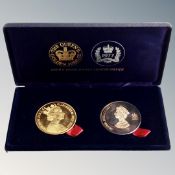A Queen Elizabeth II Golden Jubilee limited two coin set in box, two Euro commemorative coin set,