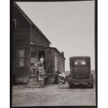 Photographer: Arthur Rothstein - resettlement photo of family during the era of the Great Pains in