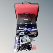 A Sega Saturn with leads and controller in original box together with Maxis carry bag