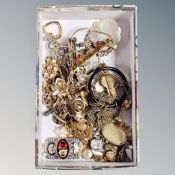 A collection of white and gilt metal jewellery,