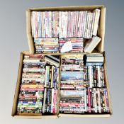 Three boxes containing approximately 150 DVD's