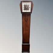 A 1930s oak cased grandaughter clock