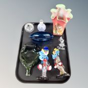 Two Murano glass clowns, glass glass ash tray in the form of a crushed bottle,