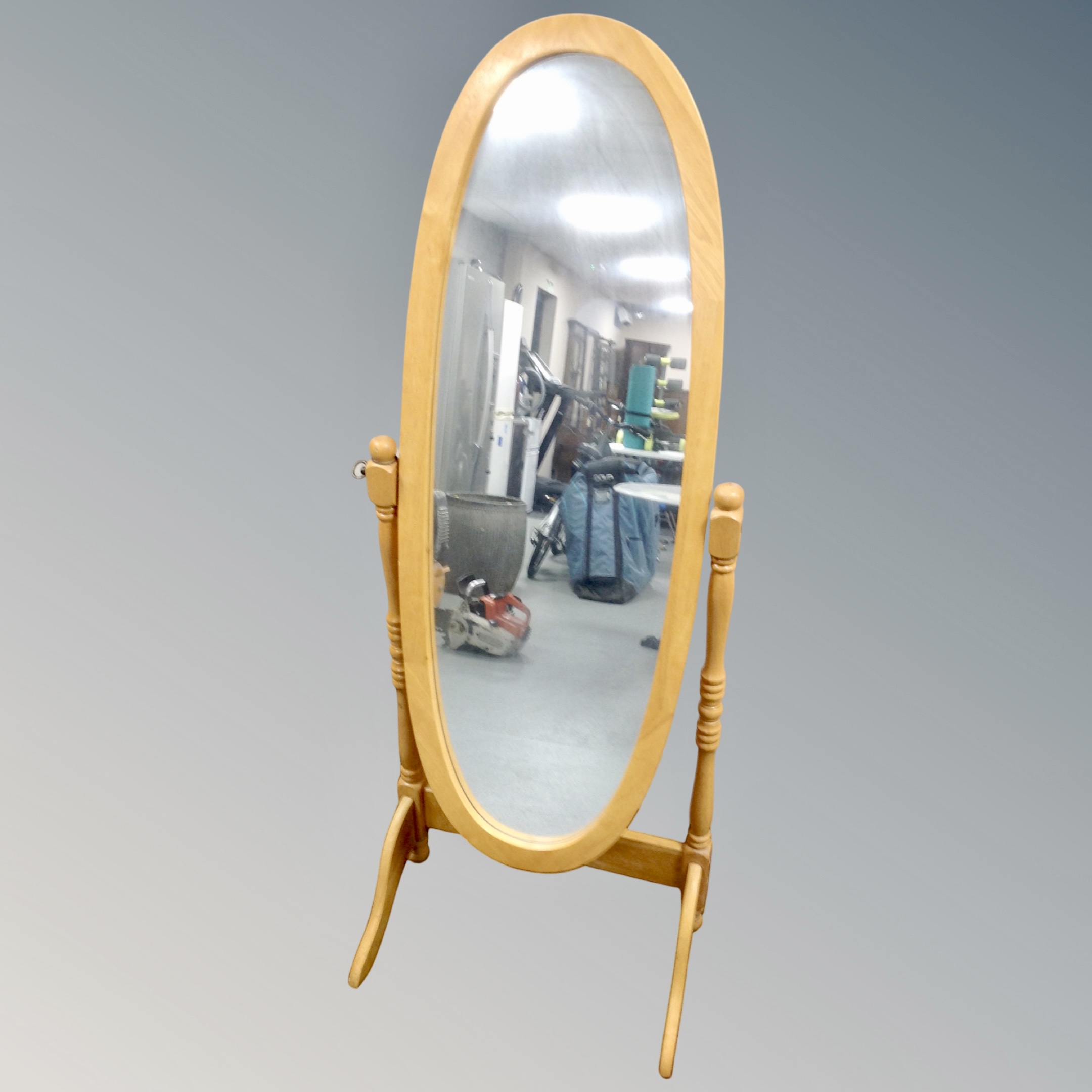 A pine cheval mirror on stand