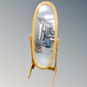 A pine cheval mirror on stand