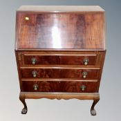 A mahogany fall fronted bureau, interior fitted with correspondence rack and inkwells,