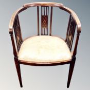 A late Victorian inlaid mahogany tub armchair