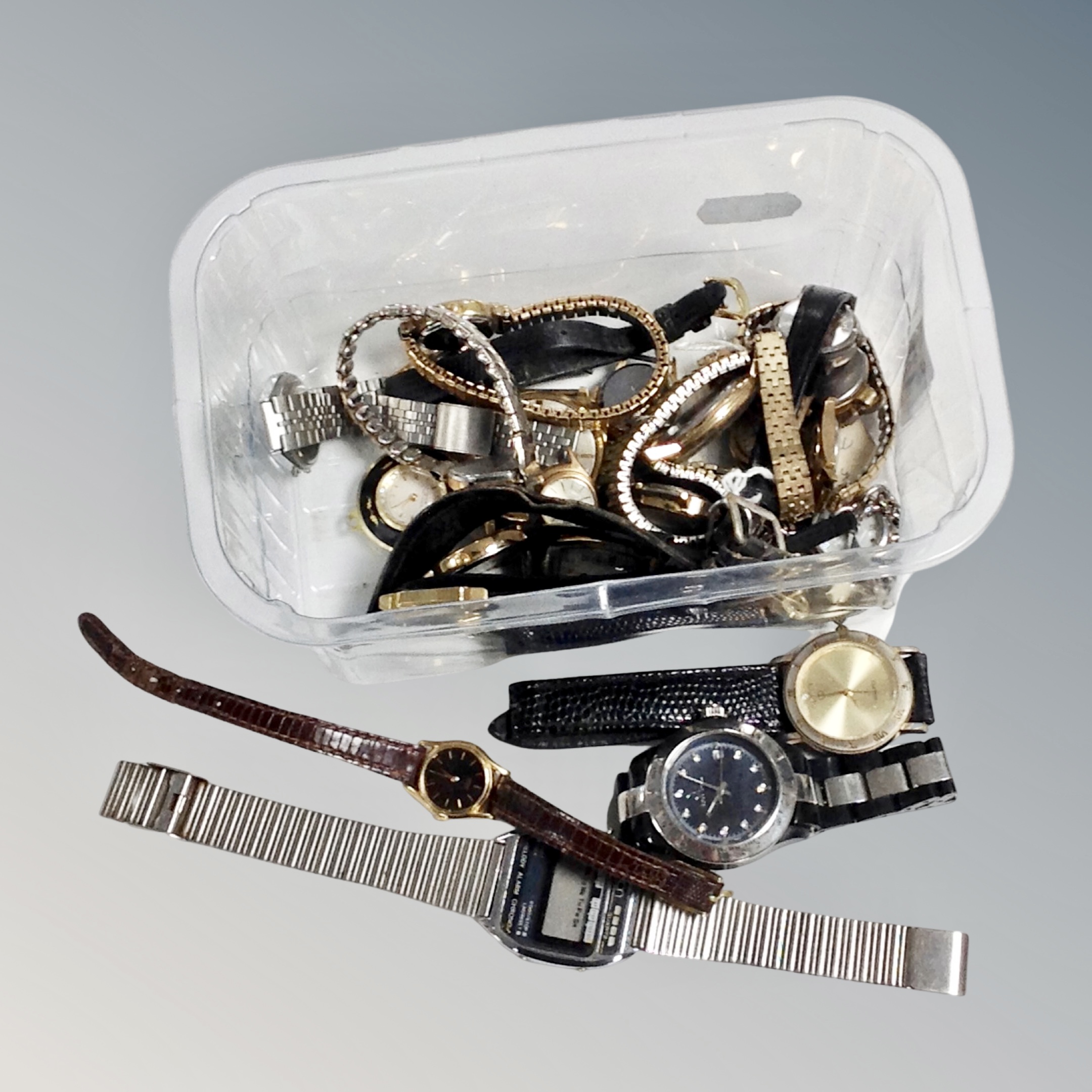 A tub of assorted ladies and gent's wrist watches