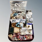 A large quantity of assorted costume jewellery, beads,