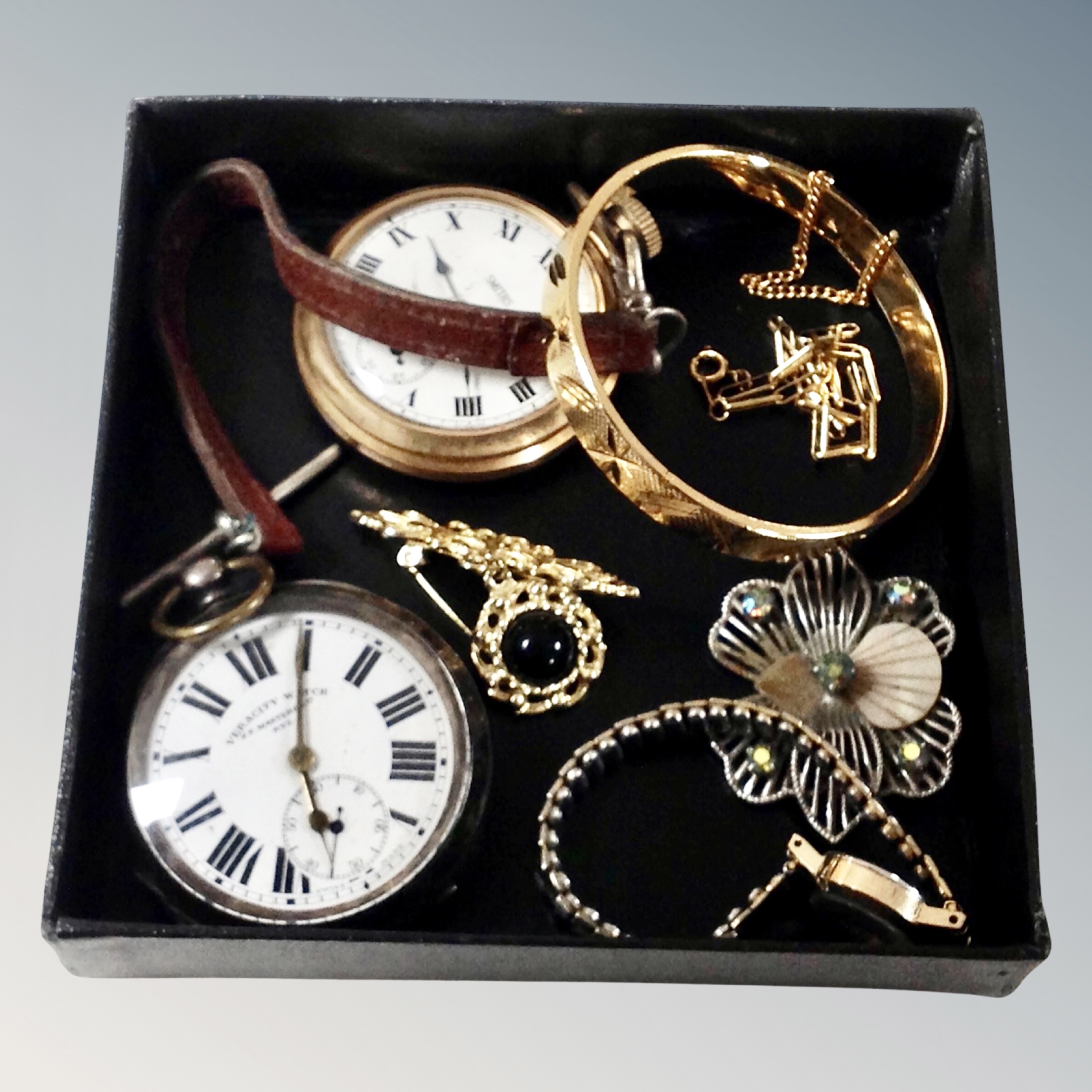A group of costume jewellery, golf plated bangle, Smiths pocket watch,