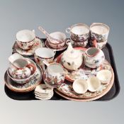 A tray of antique and later oriental tea ware