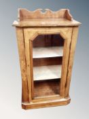 A Victorian inlaid mahogany glass door music cabinet with gallery,