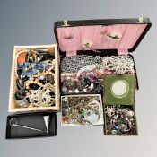 A box of mixed costume jewellery, pearls, boxed candle snuffer,