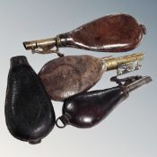 Four antique leather shot flasks