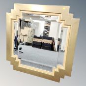 A contemporary gilt and bevelled wall mirror width 99 cm