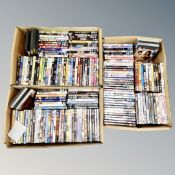 Three boxes containing approximately 150 DVD's