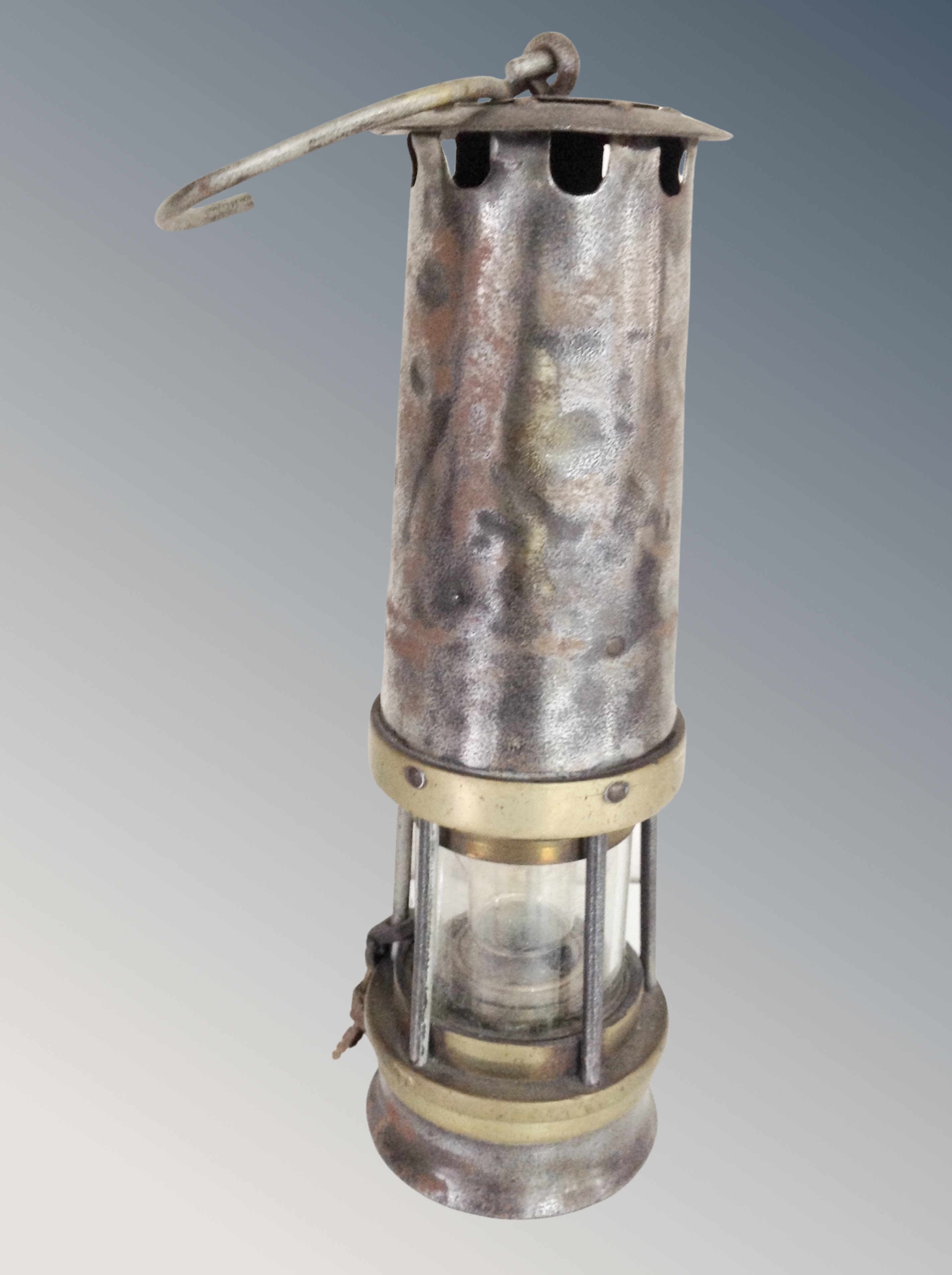 A 19th century brass and steel miner's lamp