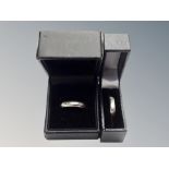 Two silver wedding bands,