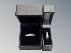 Two silver wedding bands,