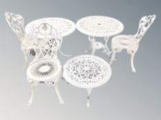 A suite of white painted metal garden furniture comprising of pair of tables ,