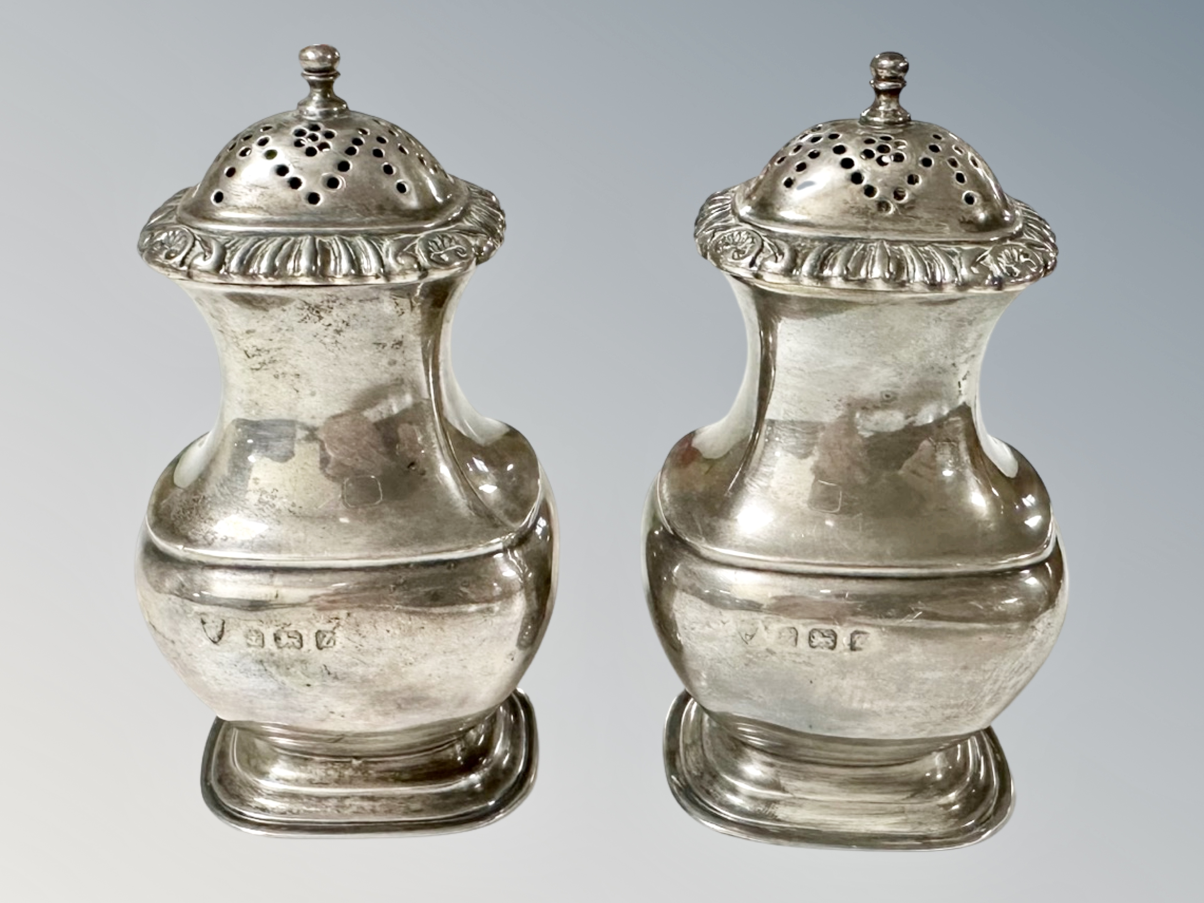 A pair of silver sifters, Birmingham marks,