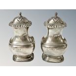 A pair of silver sifters, Birmingham marks,