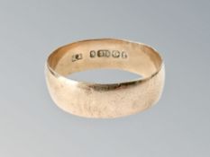 A 9ct gold band ring, size V CONDITION REPORT: 4.