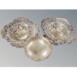 A pair of pierced silver bonbon dishes,