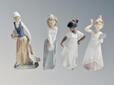 Four Nao figures of girls