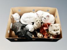 A box of cat and dog ornaments,