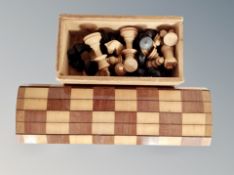 A boxwood chess set in box, kings 6cm,