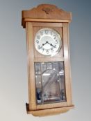 An early 20th century Junghans eight day wall clock