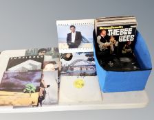 A collection of vinyl records, U2,