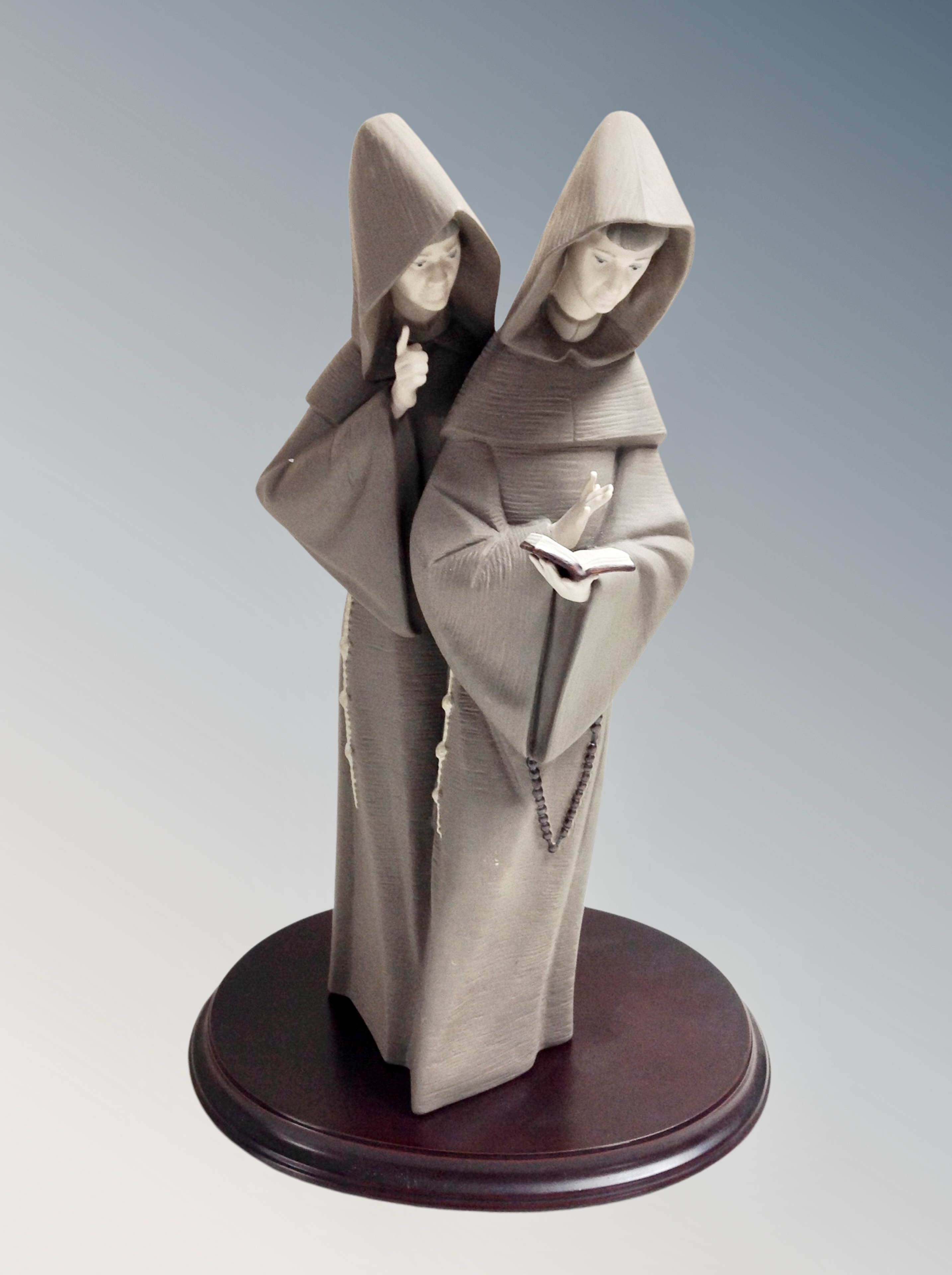 A Lladro figure of two monks 5155, height 37 cm,