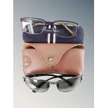 A pair of Ray Ban sunglasses in stitched leather case and pair of Tommy Hilfiger glasses in case