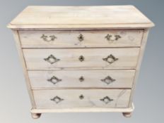 A 19th century pine chest of four drawers,